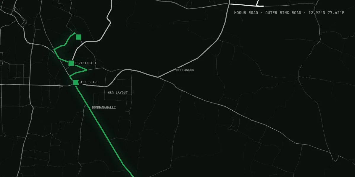 Dark map of south-east Bengaluru with Hosur Road highlighted in green, running from Electronic City to Koramangala, and the Outer Ring Road in white
